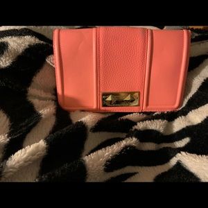 Cute, coral colored wallet.
